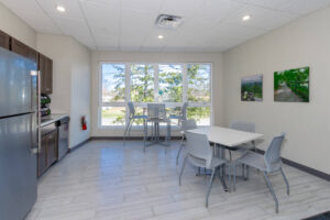 Bright break room with tables for lunch
