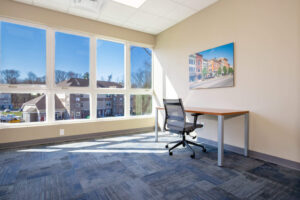 Workspace with ergonomic chairs at Sunrise Solars Coworking
