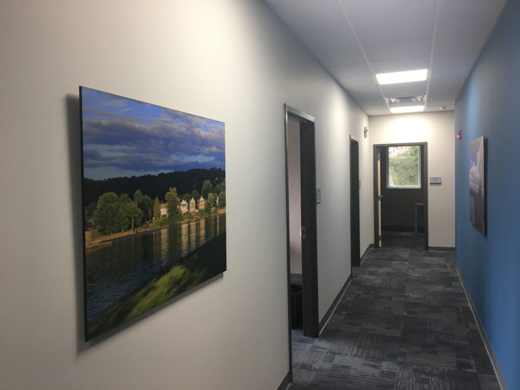 Hallway connecting neighboring private offices